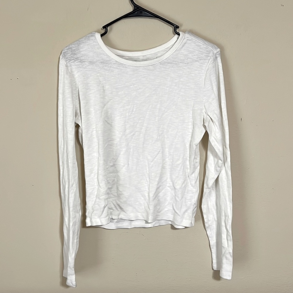 size youth large but can fit an adult small. a little bit see through